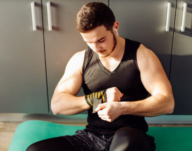 Young Man Doing Workout Exercises at Home for Fitness Training