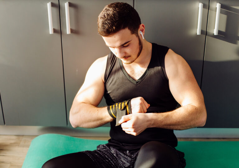 Young Man Doing Workout Exercises at Home for Fitness Training